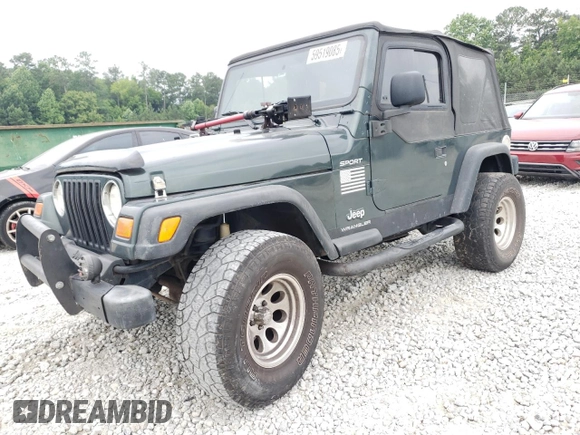 2003 Jeep Wrangler Sport with VIN 1J4FA49S03P330858, listed as a Copart auction lot 59519085 with Not provided miles and Salvage title. Bid and sale history available at DreamBid. Image 1.