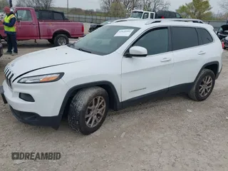 2014 Jeep Cherokee Latitude with VIN 1C4PJMCSXEW150735, listed as a IAAI auction lot 42020944 with 76,303 mi miles and . Bid and sale history available at carsss.com. Image 23.