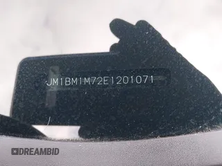 2014 Mazda 3 i Grand Touring with VIN JM1BM1M72E1201071, listed as a IAAI auction lot 42087477 with 127,111 mi miles and . Bid and sale history available at DreamBid. Image 9.