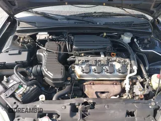 2003 Honda Civic LX with VIN 1HGEM22583L085950, listed as a IAAI auction lot 41791231 with 175,837 mi miles. Bid and sale history available at carsss.com. Image 10.