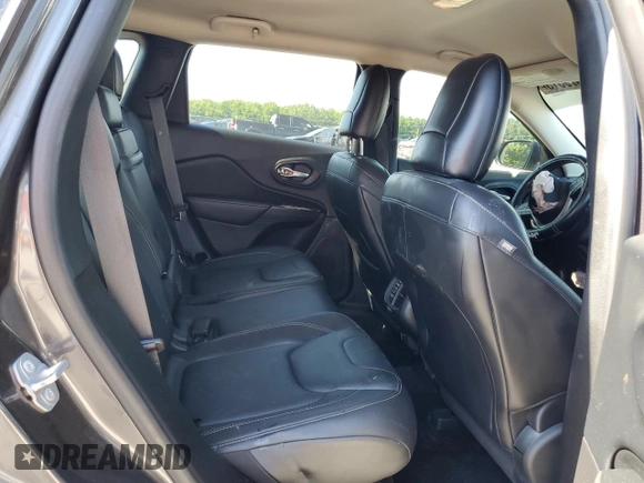 2016 Jeep Cherokee Limited z VIN 1C4PJLDB3GW106975, wystawiony jako Copart lot #63079515 z przebiegiem 72 165 mil mil oraz Szkoda całkowita • Salvage title. Historia ofert i sprzedaży dostępna na DreamBid. Obrazek 11.