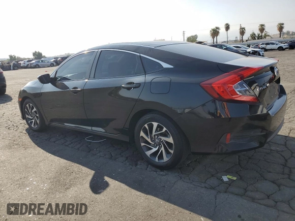 2016 Honda Civic EX with VIN 2HGFC2F74GH561164, listed as a Copart auction lot 54536215 with 86,445 mi miles and Salvage Title. Bid and sale history available at DreamBid. Image 2.