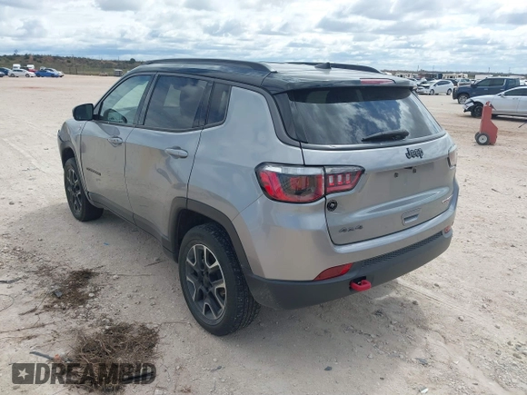 2020 Jeep Compass Trailhawk z VIN 3C4NJDDB5LT171727, wystawiony jako IAAI lot #41844523 z przebiegiem 103 952 mil mil oraz . Historia ofert i sprzedaży dostępna na DreamBid. Obrazek 3.