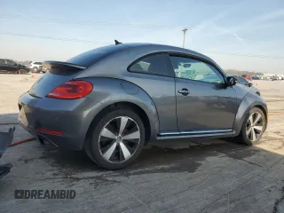 2012 Volkswagen Beetle with VIN 3VWV87AT3CM609968, listed as a Copart auction lot 50916325 with 148,004 mi miles and Salvage Title. Bid and sale history available at DreamBid. Image 3.