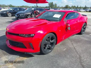 2018 Chevrolet Camaro 1LT with VIN 1G1FB1RX4J0115866, listed as a IAAI auction lot 41153245 with 71,582 mi miles. Bid and sale history available at carsss.com. Image 2.
