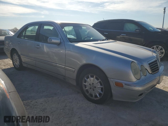 2002 Mercedes-Benz E-Class with VIN WDBJF82J92X067535, listed as a Copart auction lot 82759874 with 193,765 mi miles and Salvage Title. Bid and sale history available at carsss.com. Image 4.