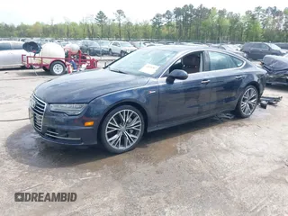 2018 Audi A7 Prestige with VIN WAU23AFC3JN057141, listed as a IAAI auction lot 42039747 with 66,095 mi miles. Bid and sale history available at carsss.com. Image 2.