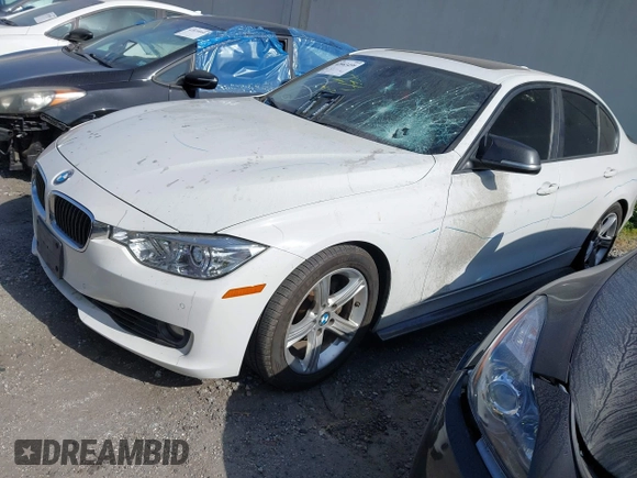 2013 BMW 3 Series 328i with VIN WBA3C1G55DNR47505, listed as a IAAI auction lot 42063459 with 96,494 mi miles. Bid and sale history available at carsss.com. Image 2.