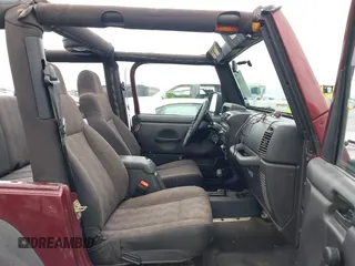 2003 Jeep Wrangler Sport with VIN 1J4FA49S63P324904, listed as a IAAI auction lot 42138001 with 170,917 mi miles and . Bid and sale history available at DreamBid. Image 5.