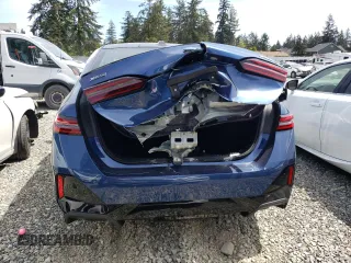 2025 BMW 5 Series with VIN WBA13FK06SCT74610, listed as a Copart auction lot 55362185 with Not provided miles and Salvage title. Bid and sale history available at DreamBid. Image 6.