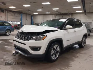 2021 Jeep Compass Limited with VIN 3C4NJCCB0MT576990, listed as a IAAI auction lot 41710809 with 77,903 mi miles. Bid and sale history available at carsss.com. Image 2.