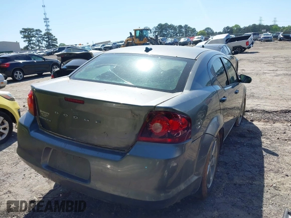 2013 Dodge Avenger SE with VIN 1C3CDZAB1DN658140, listed as a IAAI auction lot 41998306 with 215,548 mi miles. Bid and sale history available at carsss.com. Image 4.