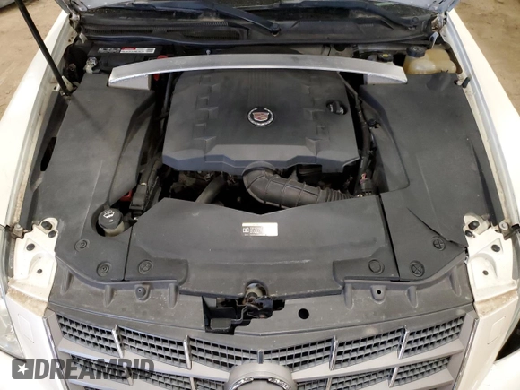 2010 Cadillac STS AWD z VIN 1G6DU6EV0A0106434, wystawiony jako Copart lot #52439915 z przebiegiem 90 187 mil mil oraz Czysty tytuł • Clean title. Historia ofert i sprzedaży dostępna na DreamBid. Obrazek 11.