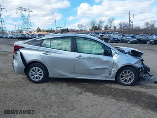 2022 Toyota Prius L Eco with VIN JTDKAMFU7N3176041, listed as a IAAI auction lot 41562977 with 61,964 mi miles. Bid and sale history available at carsss.com. Image 13.