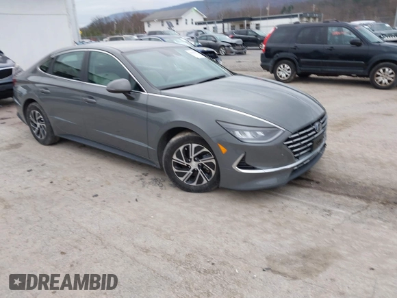 2022 Hyundai Sonata Hybrid Blue with VIN KMHL24JJ2NA048439, listed as a IAAI auction lot 40942477 with 64,855 mi miles. Bid and sale history available at carsss.com. Image 1.