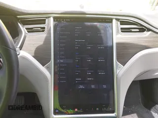2016 Tesla Model S 70 kWh Battery with VIN 5YJSA1E14GF141579, listed as a IAAI auction lot 42209119 with 105,947 mi miles and . Bid and sale history available at carsss.com. Image 17.