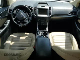 2020 Ford Edge SEL z VIN 2FMPK3J94LBA57940, wystawiony jako Copart lot #54901165 z przebiegiem 117 096 mil mil oraz Szkoda całkowita • Salvage title. Historia ofert i sprzedaży dostępna na DreamBid. Obrazek 8.