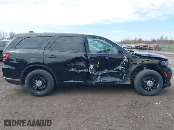 2023 Dodge Durango Pursuit with VIN 1C4RDJFG9PC605021, listed as a IAAI auction lot 41945610 with 7,031 mi miles and . Bid and sale history available at DreamBid. Image 14.