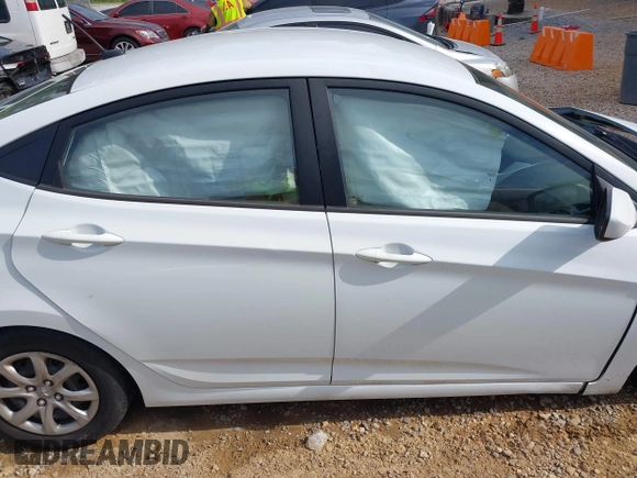 2014 Hyundai Accent GLS z VIN KMHCT4AE5EU697201, wystawiony jako IAAI lot #42157098 z przebiegiem 139 181 mil mil oraz . Historia ofert i sprzedaży dostępna na DreamBid. Obrazek 13.