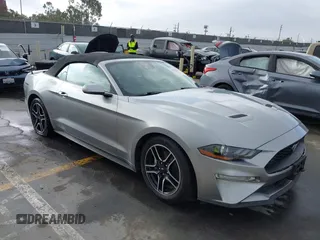 2021 Ford Mustang EcoBoost z VIN 1FATP8UH7M5115605, wystawiony jako IAAI lot #42386214 z przebiegiem 54 584 mil mil oraz . Historia ofert i sprzedaży dostępna na DreamBid. Obrazek 1.