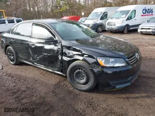 2014 Volkswagen Passat Wolfsburg Ed with VIN 1VWAT7A34EC112476, listed as a IAAI auction lot 41448135 with 109,480 mi miles. Bid and sale history available at carsss.com. Image 1.