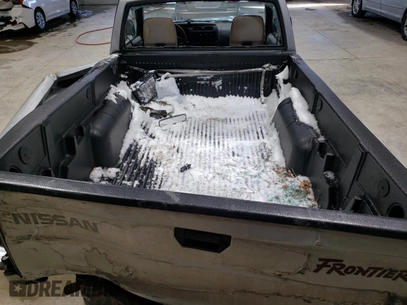 2000 Nissan Frontier XE z VIN 1N6DD21S1YC392012, wystawiony jako Copart lot #41843855 z przebiegiem 208 449 mil mil oraz Szkoda całkowita • Salvage title. Historia ofert i sprzedaży dostępna na DreamBid. Obrazek 10.