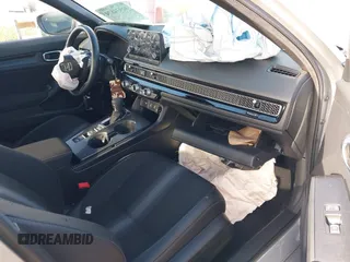 2025 Honda Civic Sport z VIN 2HGFE2F57SH519010, wystawiony jako IAAI lot #41934874 z przebiegiem 7999 mil mil oraz . Historia ofert i sprzedaży dostępna na DreamBid. Obrazek 5.