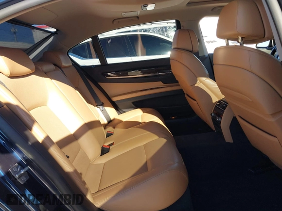 2012 BMW 7 Series 750Li xDrive with VIN WBAKC8C52CC436399, listed as a IAAI auction lot 41214440 with 122,532 mi miles and . Bid and sale history available at DreamBid. Image 8.