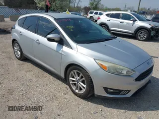 2015 Ford Focus SE with VIN 1FADP3K20FL288791, listed as a IAAI auction lot 42118958 with 164,248 mi miles. Bid and sale history available at carsss.com. Image 1.