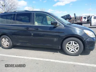 2006 Honda Odyssey EX-L z VIN 5FNRL387X6B055048, wystawiony jako IAAI lot #41974961 z przebiegiem 123 361 mil mil oraz . Historia ofert i sprzedaży dostępna na DreamBid. Obrazek 6.