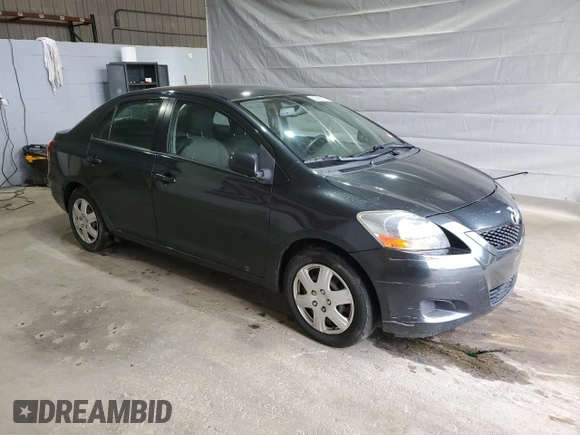 2009 Toyota Yaris z VIN JTDBT903991335683, wystawiony jako Copart lot #52565155 z przebiegiem 143 737 mil mil oraz Szkody całkowita. Historia ofert i sprzedaży dostępna na DreamBid. Obrazek 4.