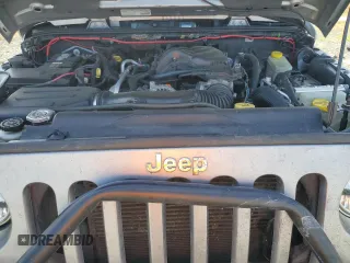 2014 Jeep Wrangler Unlimited Sahara with VIN 1C4HJWEG1EL126611, listed as a Copart auction lot 57169485 with 122,000 mi miles and Salvage title. Bid and sale history available at DreamBid. Image 11.