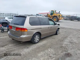2003 Honda Odyssey EX z VIN 2HKRL18683H505577, wystawiony jako IAAI lot #42118231 z przebiegiem 234 329 mil mil oraz . Historia ofert i sprzedaży dostępna na DreamBid. Obrazek 4.