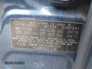 2004 Hyundai Sonata GLS with VIN KMHWF35H34A082570, listed as a IAAI auction lot 41930653 with 99,490 mi miles. Bid and sale history available at carsss.com. Image 9.