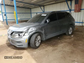 2018 Volkswagen Tiguan S with VIN 3VV1B7AXXJM054778, listed as a Copart auction lot 61294795 with 87,330 mi miles and Salvage title. Bid and sale history available at DreamBid. Image 1.