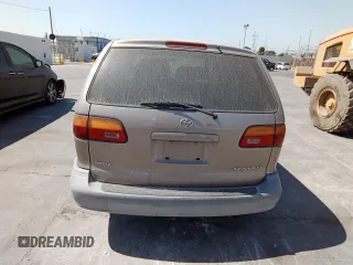 1999 Toyota Sienna CE with VIN 4T3ZF19C6XU147017, listed as a Copart auction lot 81604574 with 153,181 mi miles and Clean Title. Bid and sale history available at carsss.com. Image 6.
