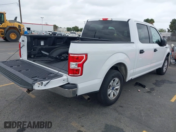 2018 Ford F-150 XL with VIN 1FTEW1CB4JKC87131, listed as a IAAI auction lot 42120579 with 93,143 mi miles. Bid and sale history available at carsss.com. Image 4.