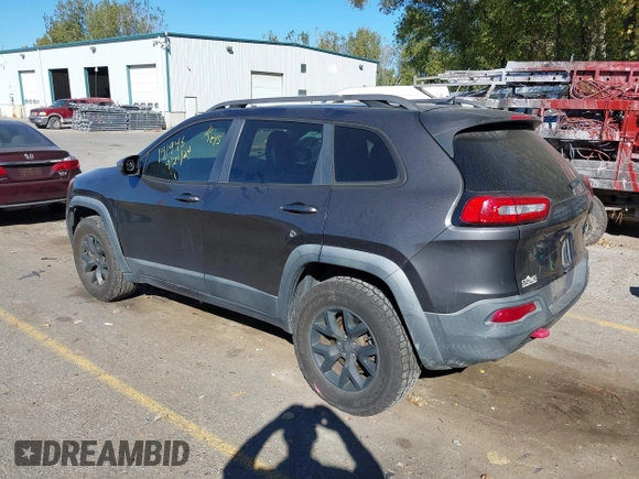 2014 Jeep Cherokee Trailhawk with VIN 1C4PJMBB0EW237741, listed as a IAAI auction lot 40505251 with 139,883 mi miles and . Bid and sale history available at DreamBid. Image 3.