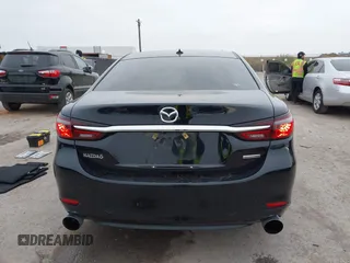 2020 Mazda 6 Grand Touring with VIN JM1GL1TY5L1513949, listed as a IAAI auction lot 40953540 with 55,616 mi miles and . Bid and sale history available at DreamBid. Image 16.