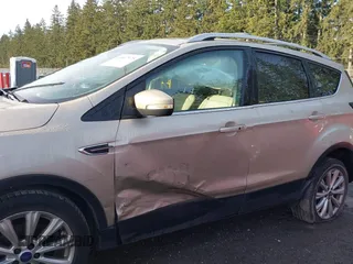 2017 Ford Escape Titanium with VIN 1FMCU0JD0HUB79739, listed as a IAAI auction lot 41807975 with 121,902 mi miles. Bid and sale history available at carsss.com. Image 14.