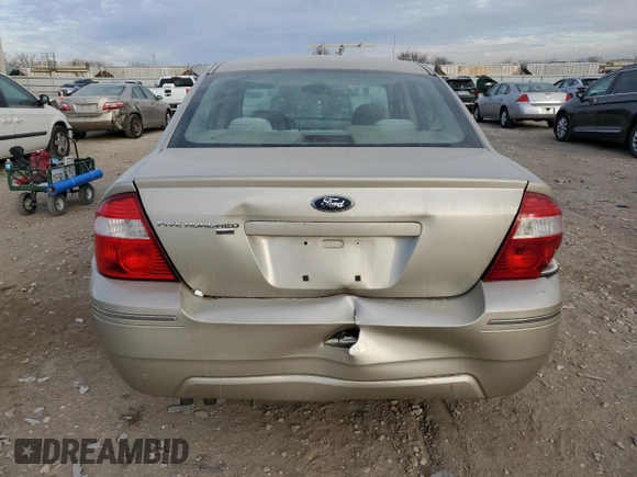 2005 Ford Five Hundred SE with VIN 1FAFP26135G148147, listed as a Copart auction lot 84011184 with 216,546 mi miles and Salvage Title. Bid and sale history available at carsss.com. Image 6.