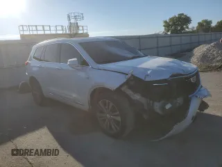 2020 Cadillac XT6 FWD Premium Luxury z VIN 1GYKPCRS9LZ107178, wystawiony jako Copart lot #72359154 z przebiegiem 154 427 mil mil oraz Nie do naprawy. Historia ofert i sprzedaży dostępna na DreamBid. Obrazek 4.