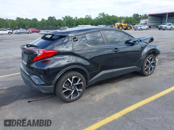 2019 Toyota C-HR XLE with VIN NMTKHMBX4KR096569, listed as a IAAI auction lot 42147017 with 111,569 mi miles and . Bid and sale history available at DreamBid. Image 4.