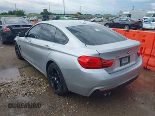 2015 BMW 4 Series 428i xDrive with VIN WBA4C9C50FD330482, listed as a IAAI auction lot 42116547 with 192,739 mi miles and . Bid and sale history available at DreamBid. Image 3.