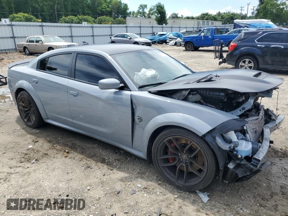 2021 Dodge Charger SRT Hellcat Widebody z VIN 2C3CDXL97MH603070, wystawiony jako Copart lot #57661925 z przebiegiem Nie podano mil oraz Szkoda całkowita • Salvage title. Historia ofert i sprzedaży dostępna na DreamBid. Obrazek 4.