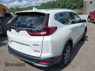 2022 Honda CR-V Touring with VIN 2HKRW2H91NH654021, listed as a IAAI auction lot 39517068 with 77,671 mi miles. Bid and sale history available at carsss.com. Image 4.