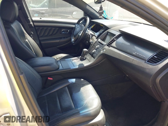 2014 Ford Taurus SEL z VIN 1FAHP2E88EG131304, wystawiony jako IAAI lot #42193759 z przebiegiem 174 465 mil mil oraz . Historia ofert i sprzedaży dostępna na DreamBid. Obrazek 5.