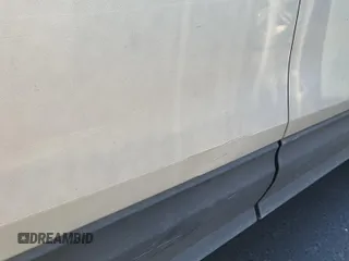 2022 Chevrolet Equinox LT z VIN 3GNAXJEV9NL143394, wystawiony jako IAAI lot #42550118 z przebiegiem 128 865 mil mil oraz . Historia ofert i sprzedaży dostępna na DreamBid. Obrazek 1.