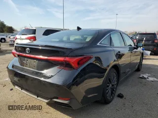 2021 Toyota Avalon Hybrid XSE z VIN 4T1EA1AB9MU007869, wystawiony jako Copart lot #66118102 z przebiegiem 18 195 mil mil oraz . Historia ofert i sprzedaży dostępna na DreamBid. Obrazek 4.