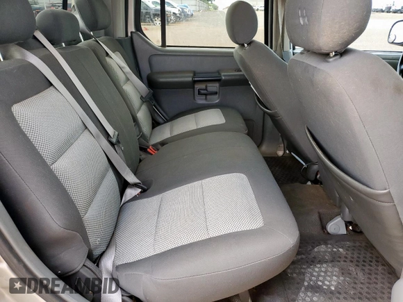 2005 Ford Explorer Sport Trac XLS with VIN 1FMZU67K95UA94980, listed as a Copart auction lot 63490315 with 126,737 mi miles and Salvage title. Bid and sale history available at DreamBid. Image 10.